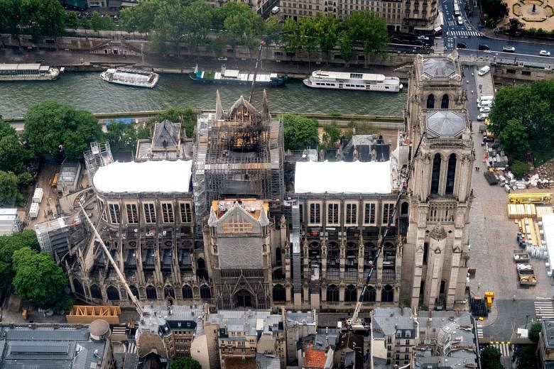 Featured Post Image - ‘Konsensus’ bahwa menara Notre-Dame harus dibangun kembali seperti semula: Menteri Prancis