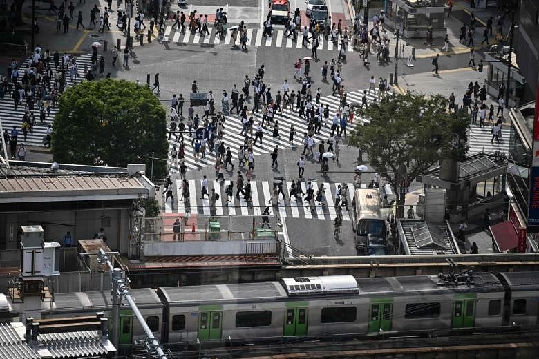 Featured Post Image - Jepang tidak akan memperkenalkan kembali keadaan darurat, kata juru bicara pemerintah, ketika kasus virus korona Tokyo mencapai rekor tertinggi